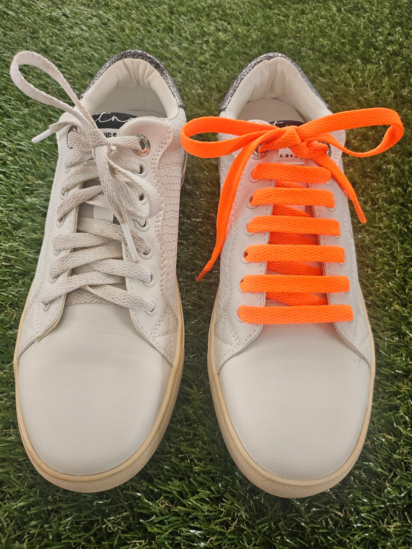 Neon orange shoelaces styled on trainers – Love Your Laces