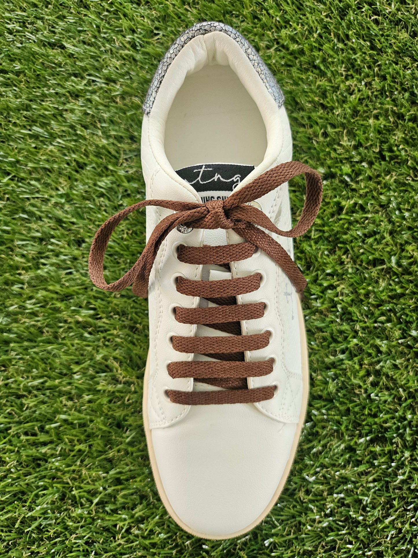 Brown shoelaces close-up – chocolate coloured flat laces for trainers
