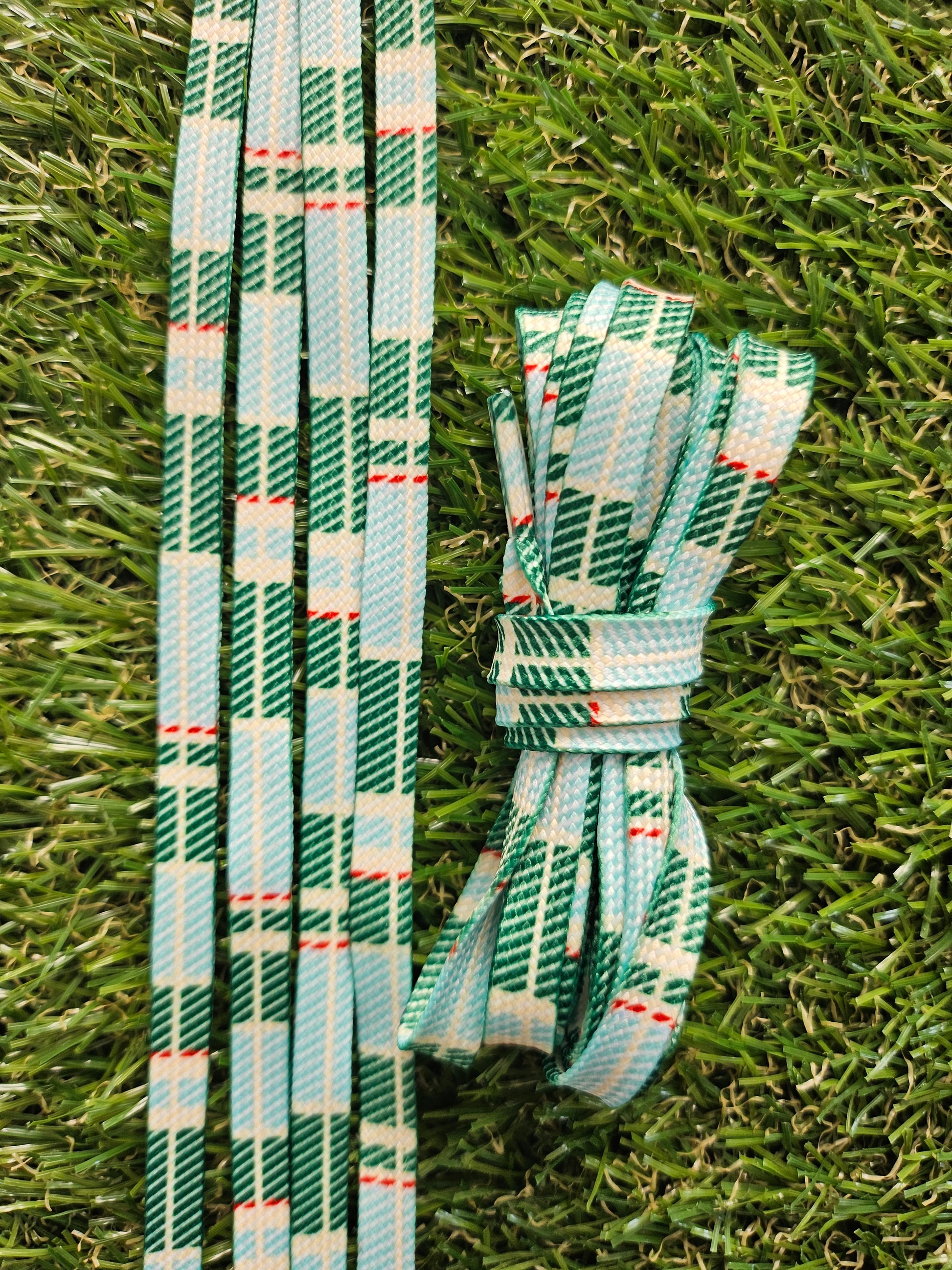 Green tartan shoelaces for golf shoes and trainers in classic Scottish style