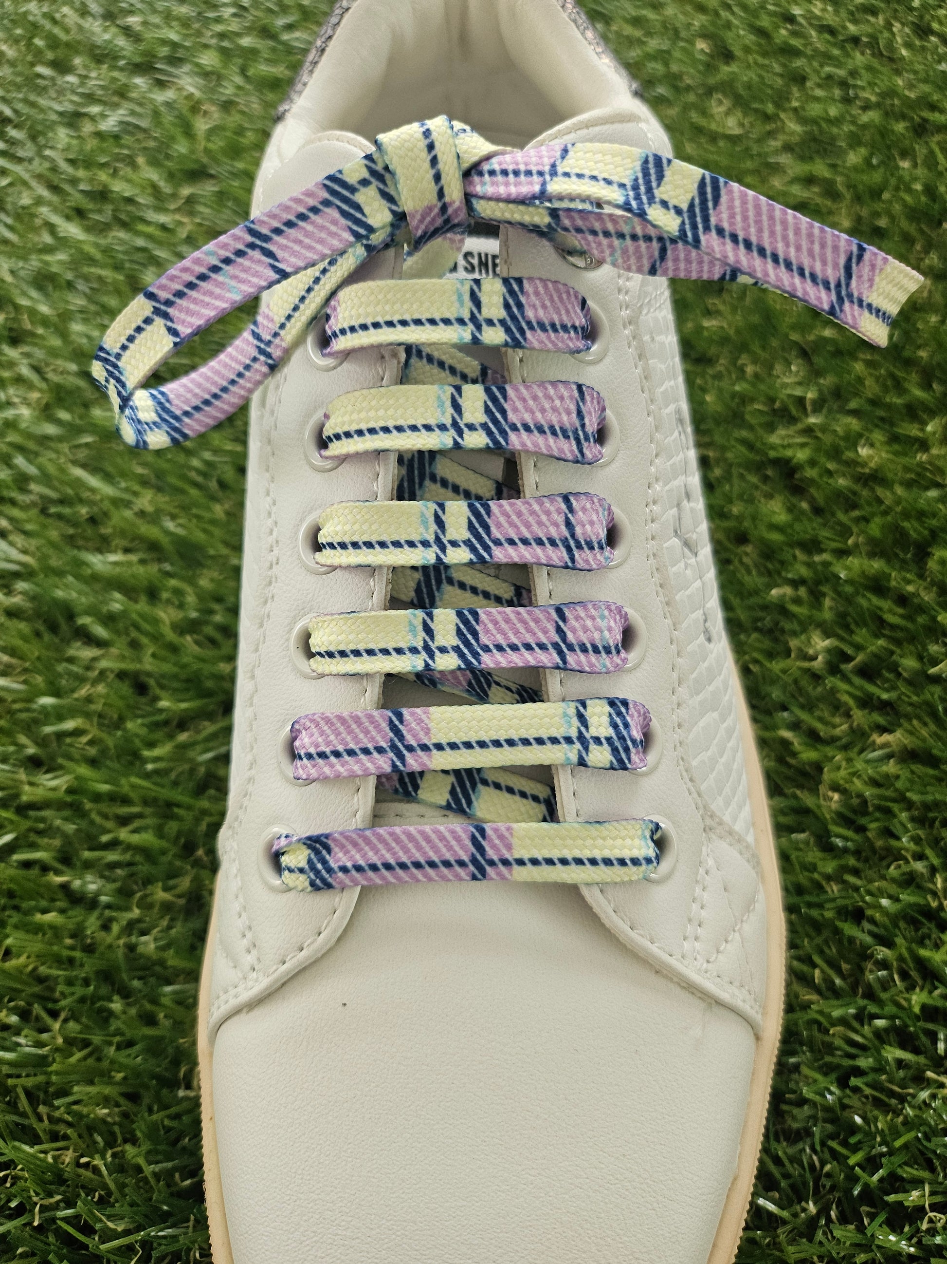 Lemon & Lilac Pastel Tartan Shoelaces on grass