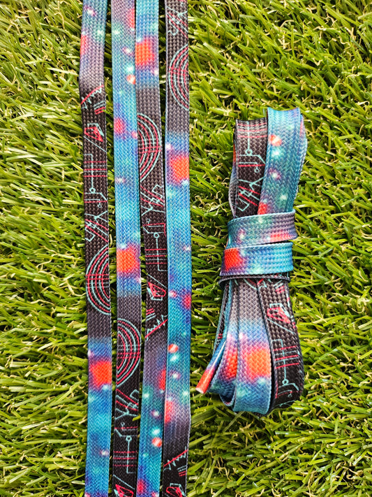 Black Space Design Shoelaces on green grass