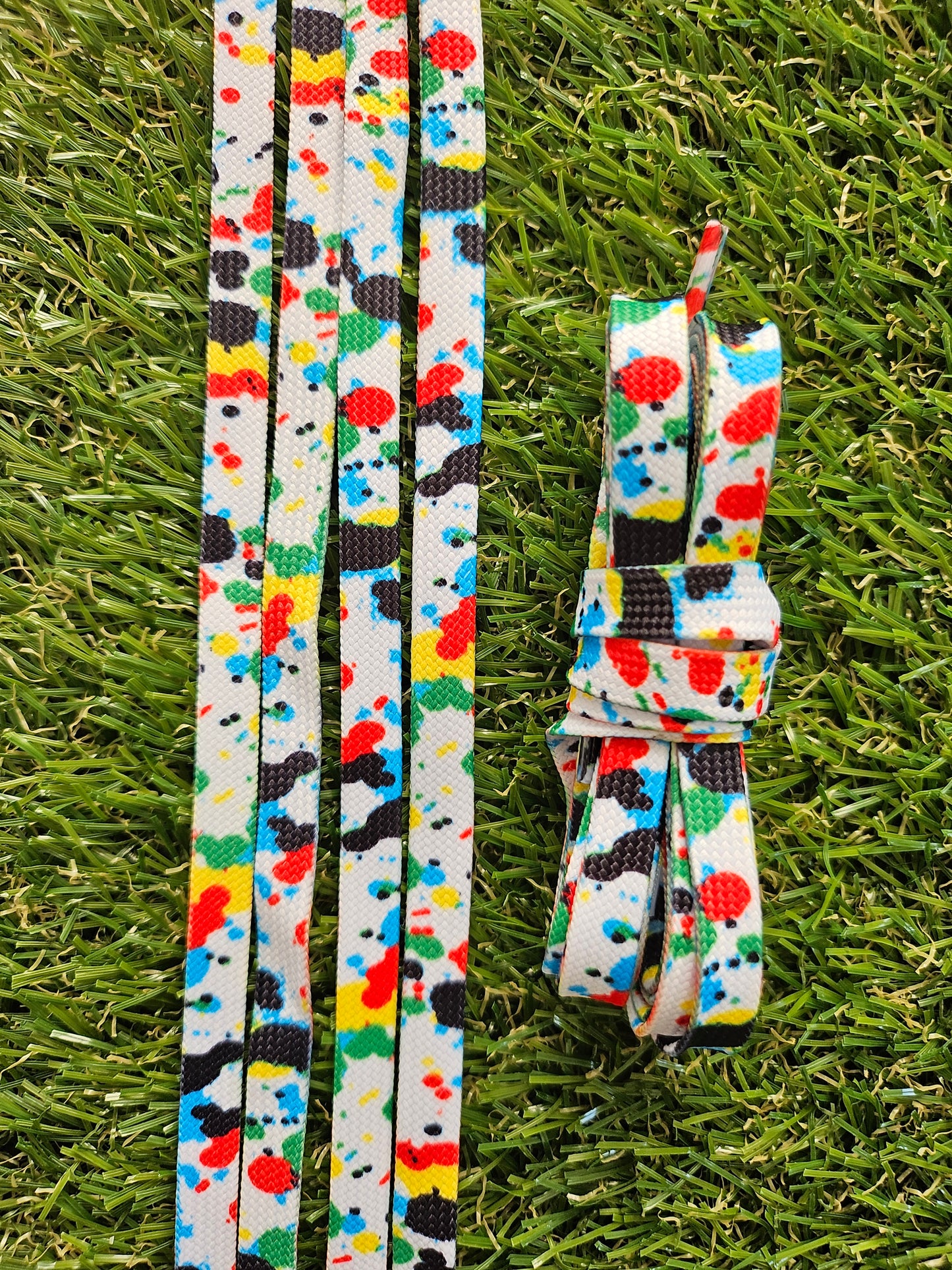 Paint Splash ShoeLaces on green grass