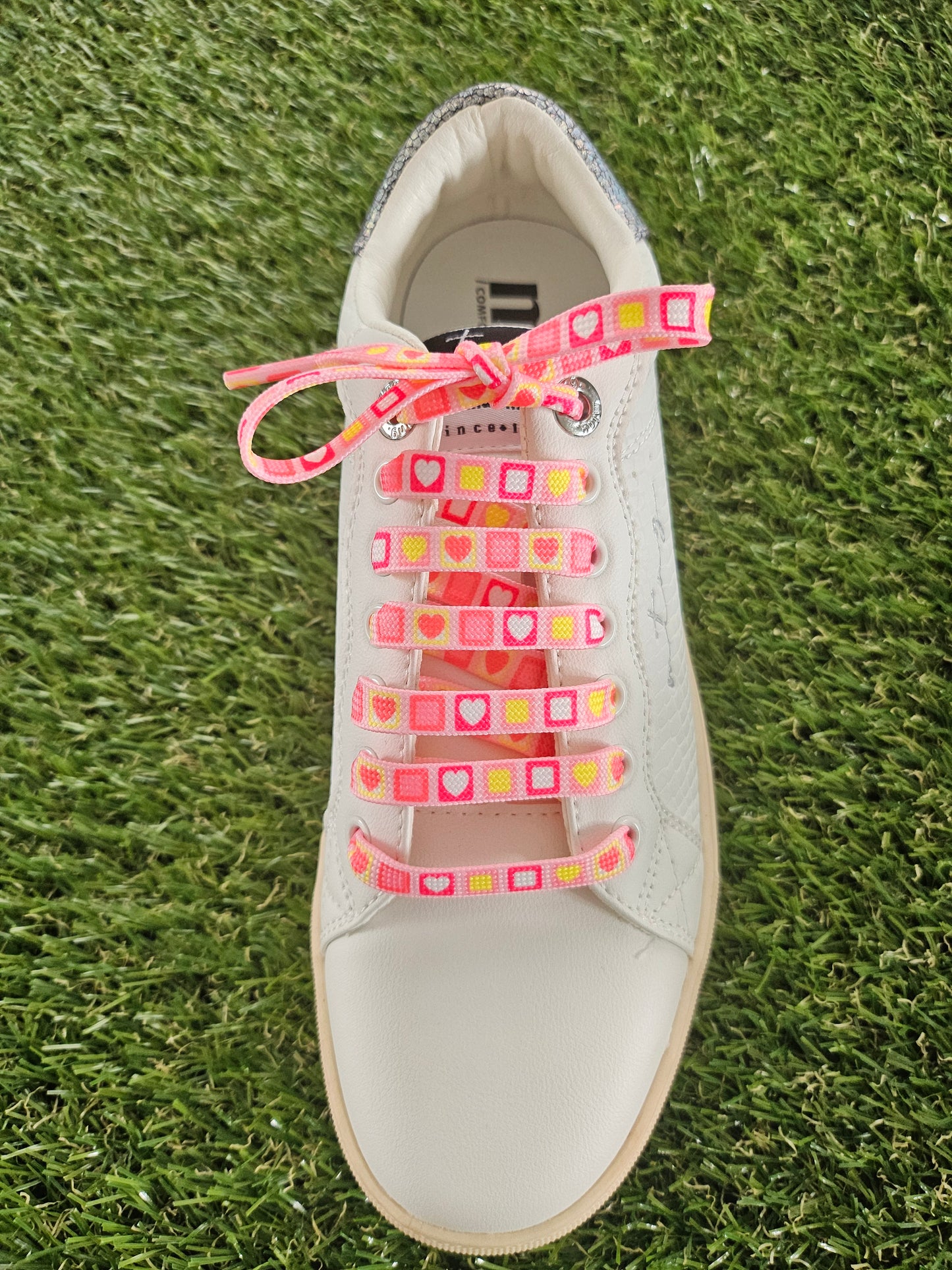 Pink Heart Candy Square Laces on green grass