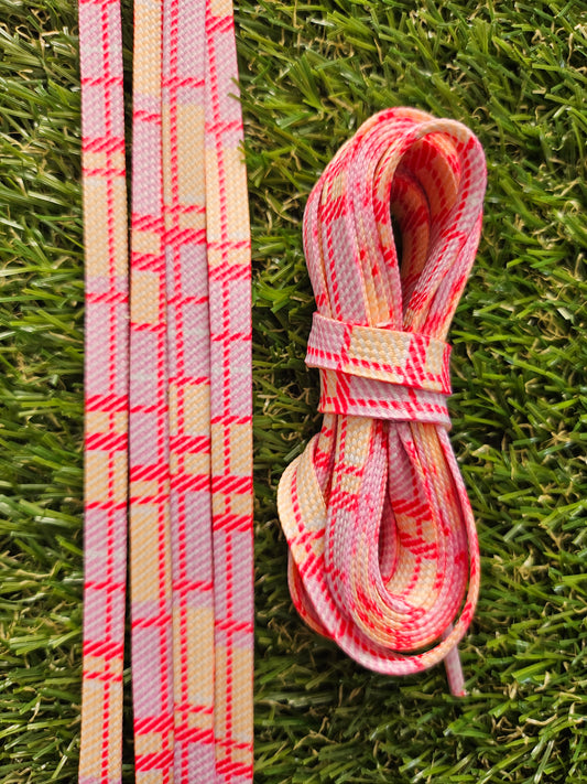 Pink and Yellow Tartan patterned shoelaces adding colour to white trainers