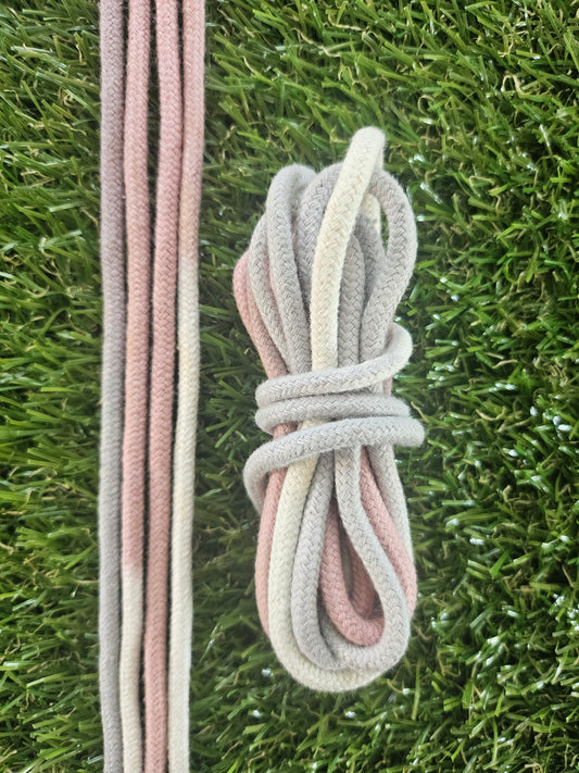 Bunch of shoelaces on grass