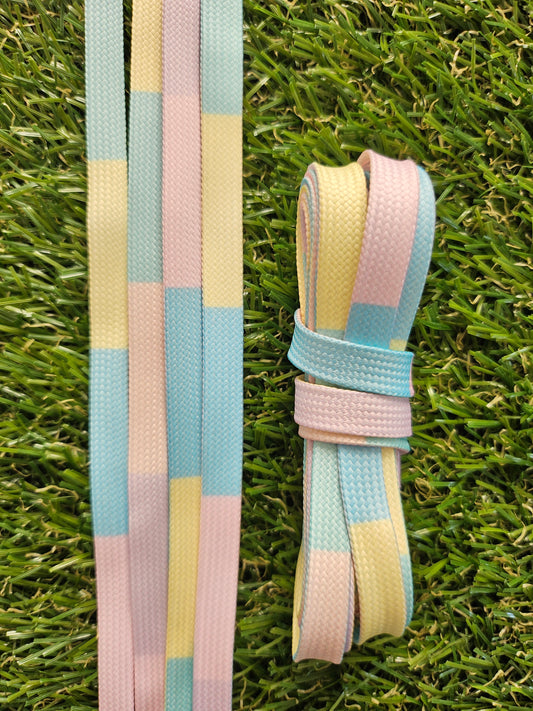 Pastel checkered shoelaces on grass