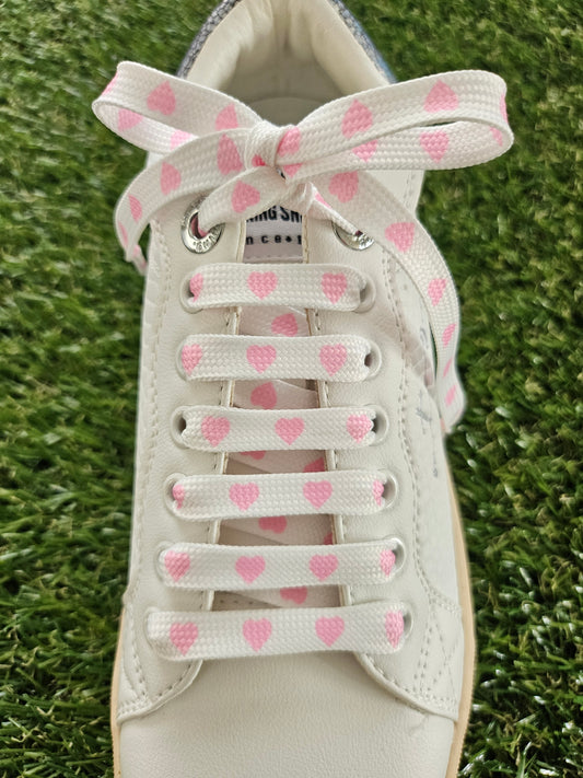 White & Pink Love Heart Laces on green grass