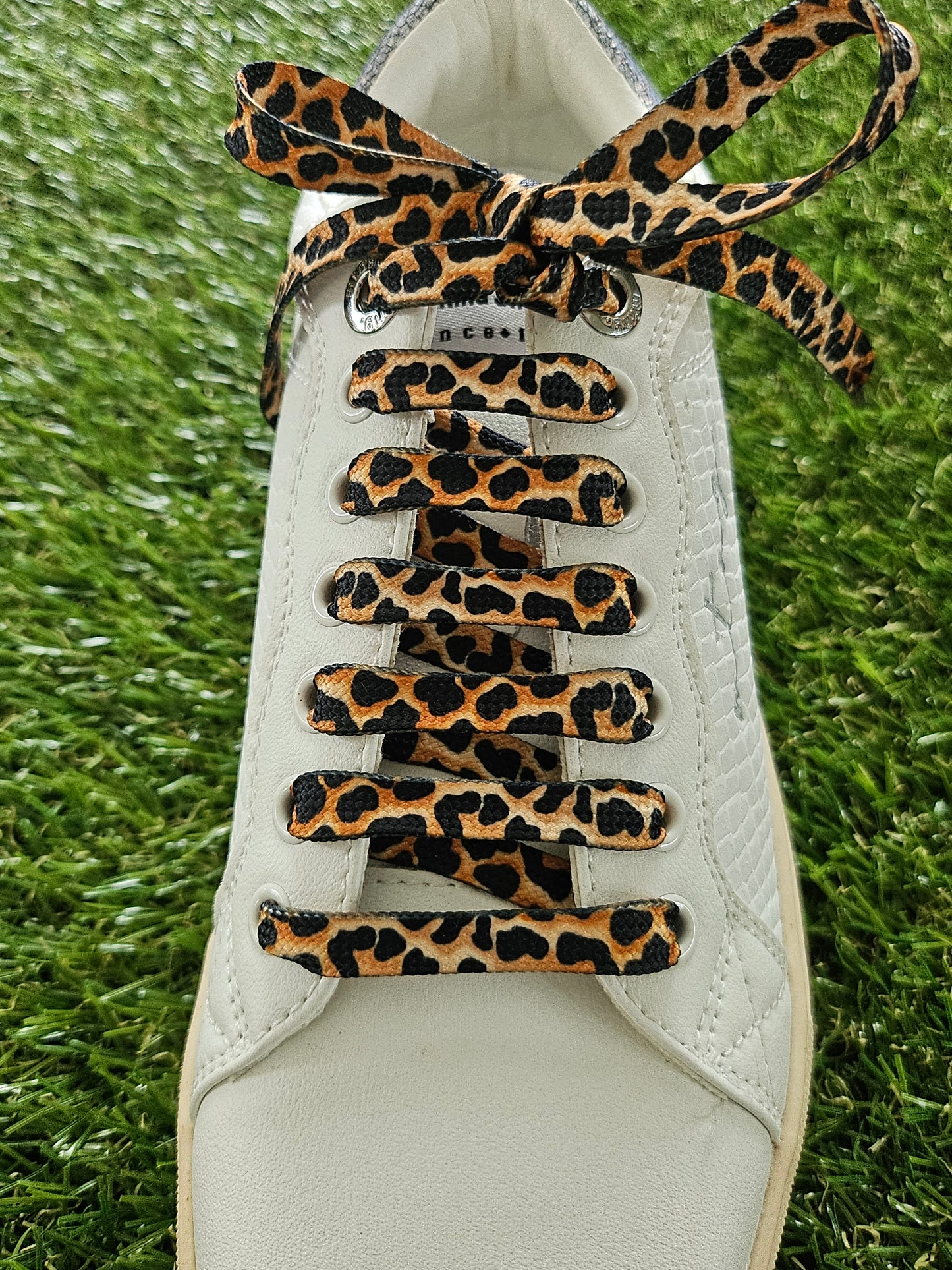 Close-up of leopard print shoelaces – animal print laces for trainers